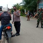 Kapolsek Rantepao Pimpin Tim Gabungan Pemeriksaan Vaksinasi di Depan Puskesmes Tallunglipu